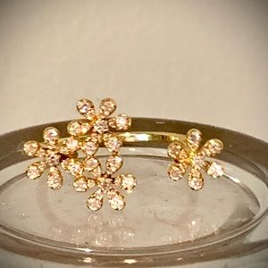 14 K yellow gold diamond flower ring